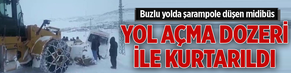 Buzlu yolda şarampole düşen midibüs yol açma dozeri ile kurtarıldı